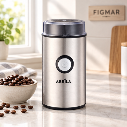 Molinillo Liberto junto a granos de café en cocina con fondo Figmar